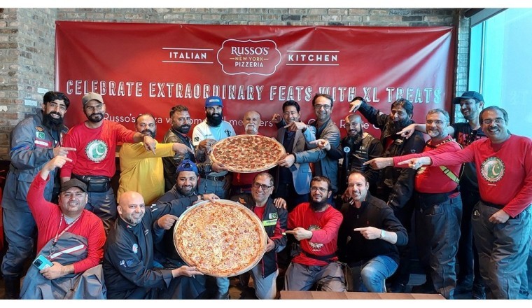 RUSSO’S HOSTS AN XL PIZZA PARTY FOR EXTRAORDINARY BIKER PILGRIMS